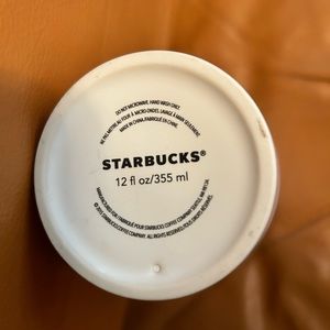 Starbucks 12 oz ceramic travel tumbler w/lid and gold peace sign